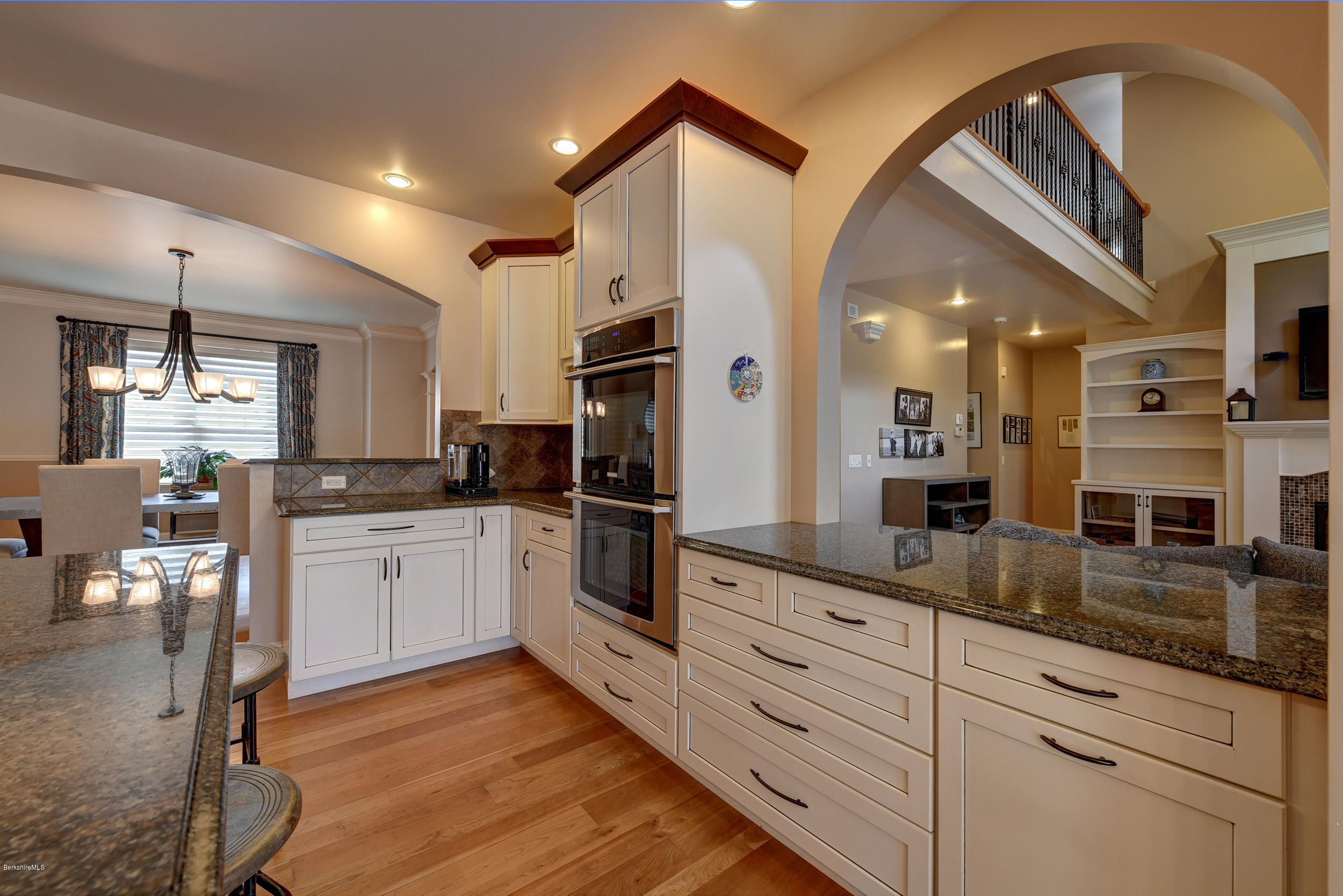 16 Lillybrook Road Pittsfield, MA 01201 - Photo 12 of 38 a kitchen with stainless steel appliances kitchen island granite countertop a stove refrigerator and cabinets