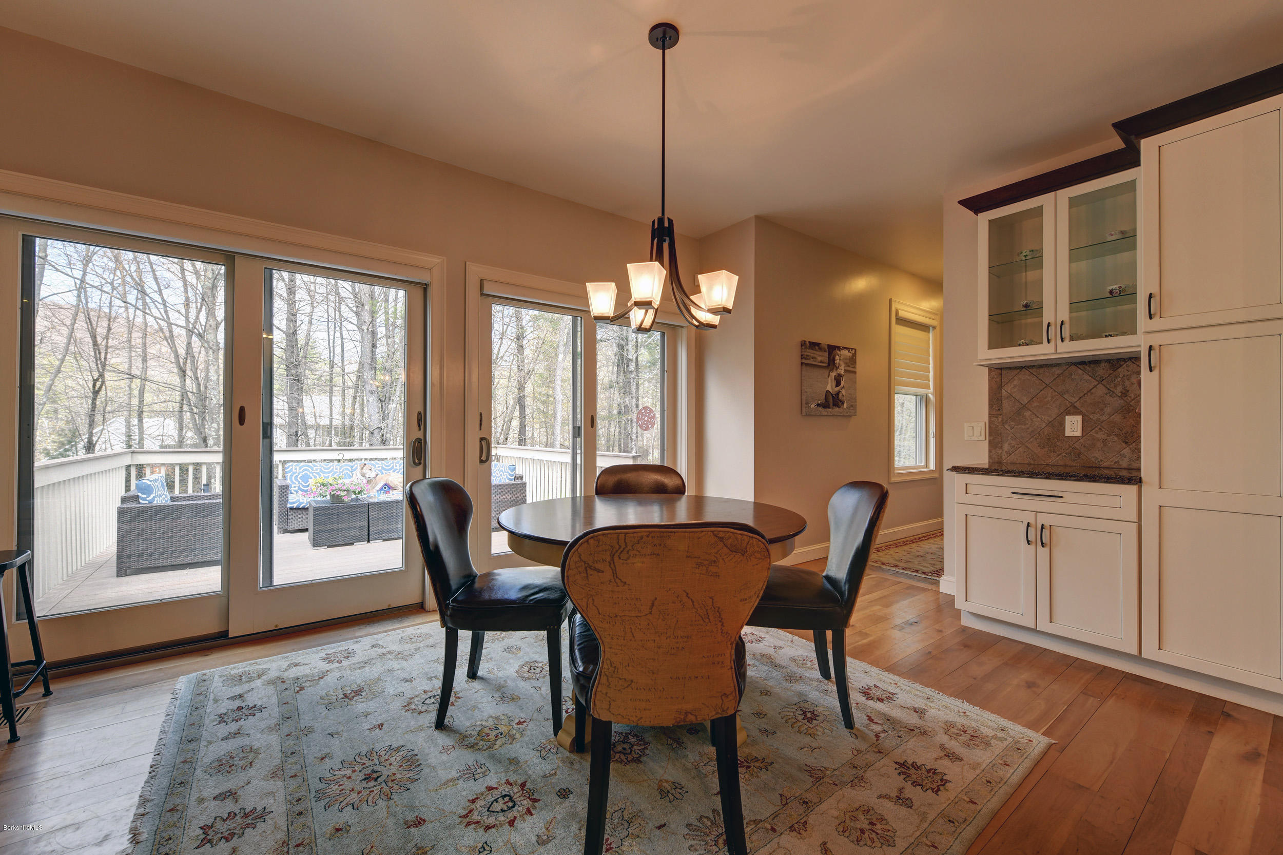 16 Lillybrook Road Pittsfield, MA 01201 - Photo 14 of 38 a dining room with furniture a chandelier and wooden floor