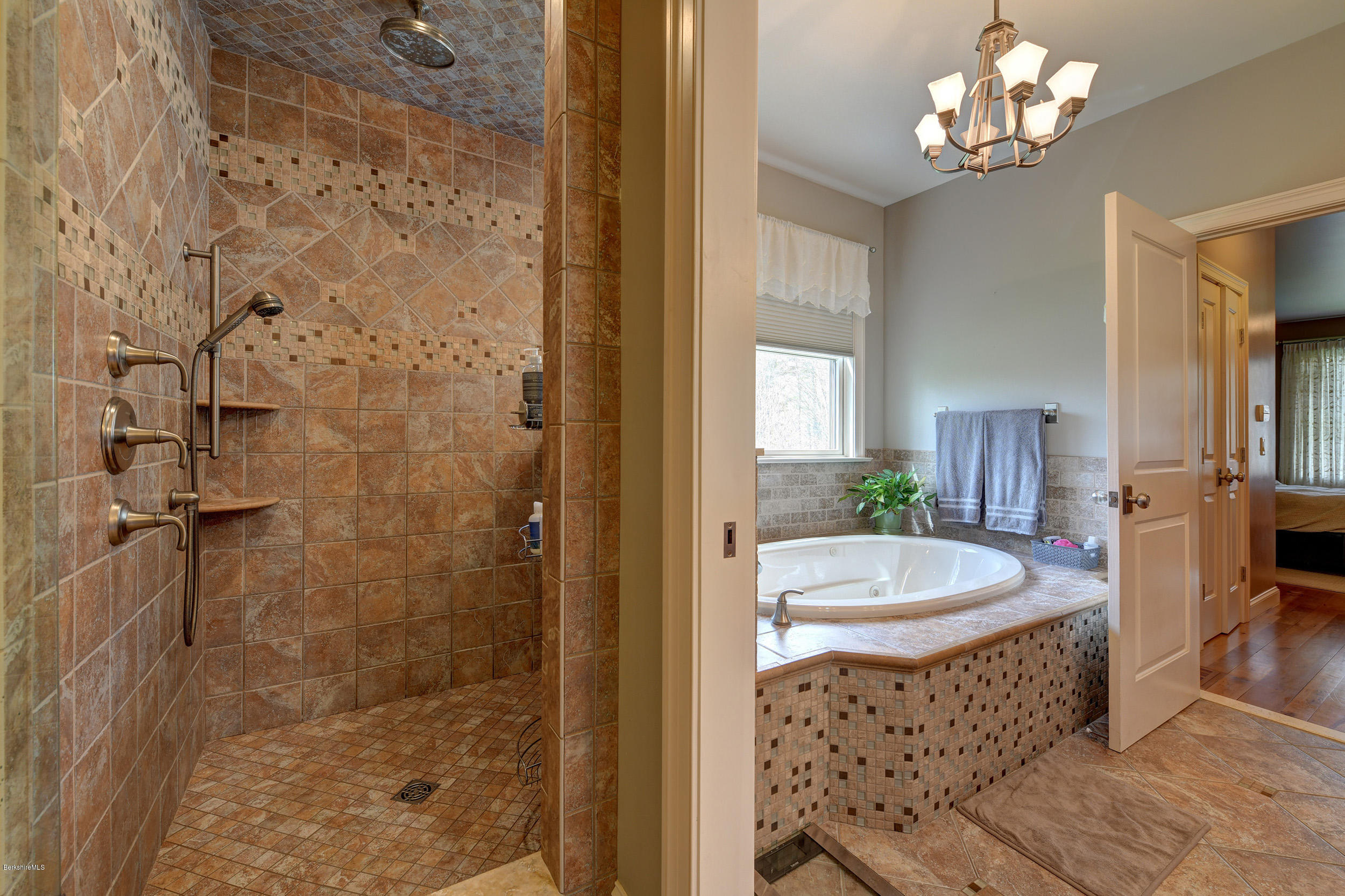 16 Lillybrook Road Pittsfield, MA 01201 - Photo 23 of 38 a bathroom with a granite countertop sink a toilet and shower
