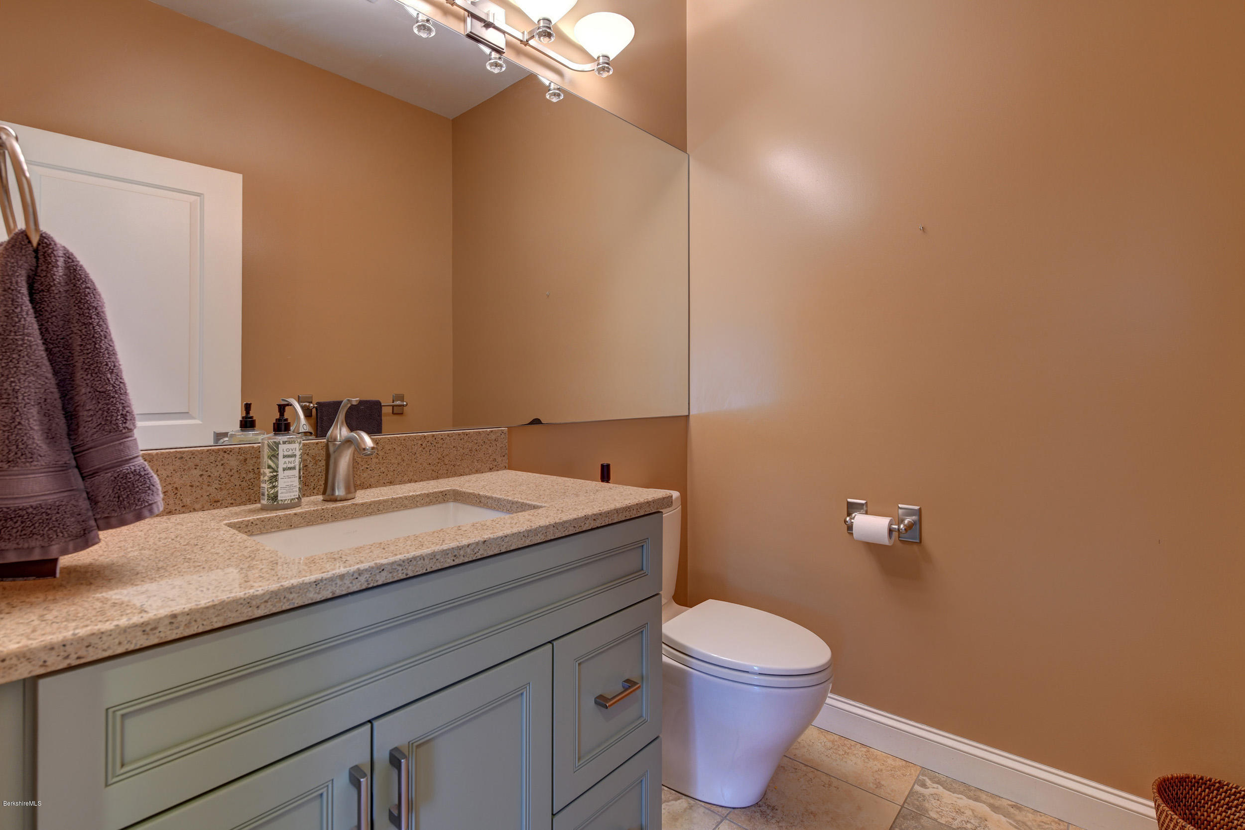 16 Lillybrook Road Pittsfield, MA 01201 - Photo 25 of 38 a bathroom with a granite countertop toilet sink and mirror