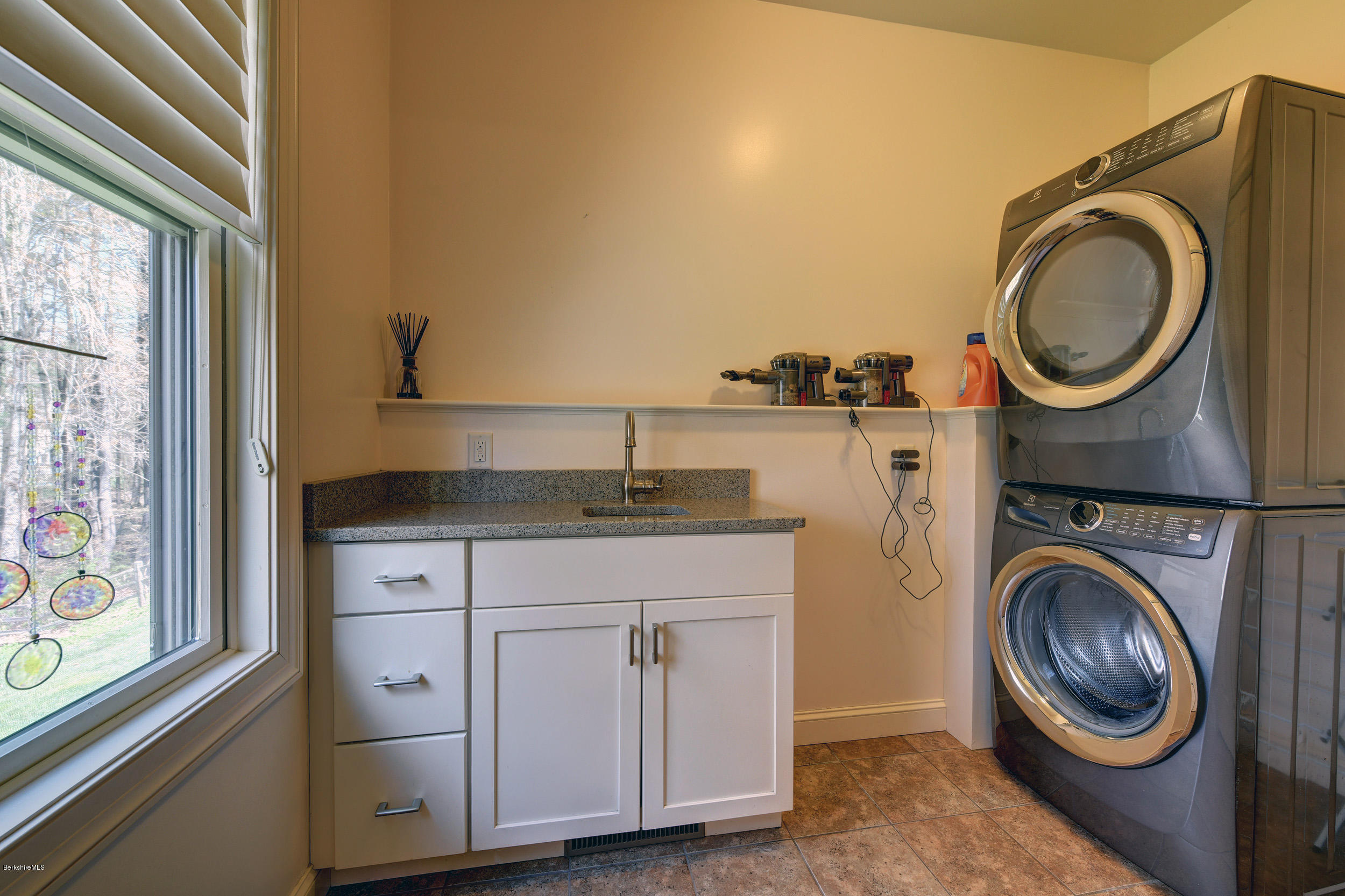 16 Lillybrook Road Pittsfield, MA 01201 - Photo 26 of 38 a view of a kitchen with washer and dryer