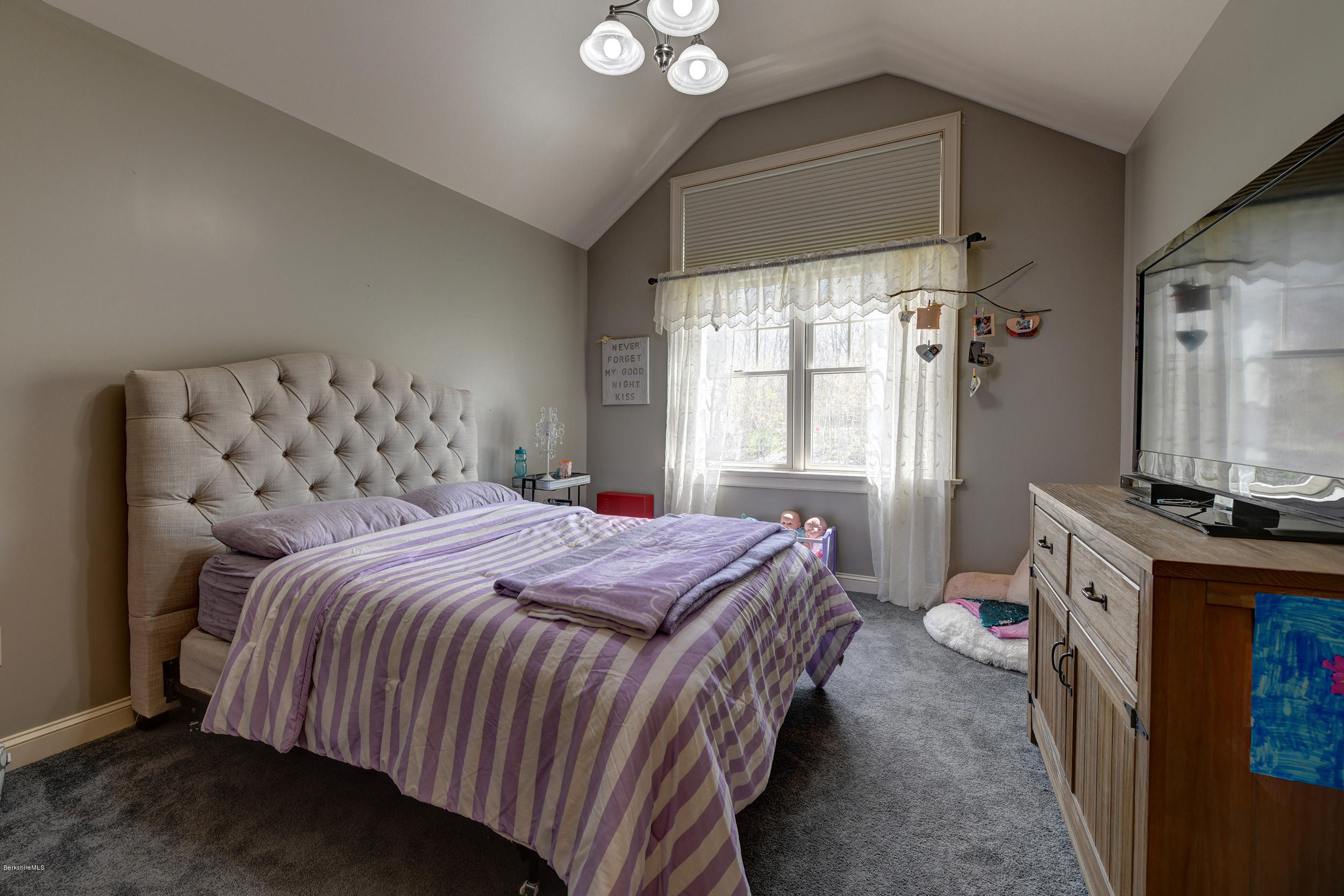 16 Lillybrook Road Pittsfield, MA 01201 - Photo 28 of 38 a bedroom with a bed and a flat tv screen on a dresser
