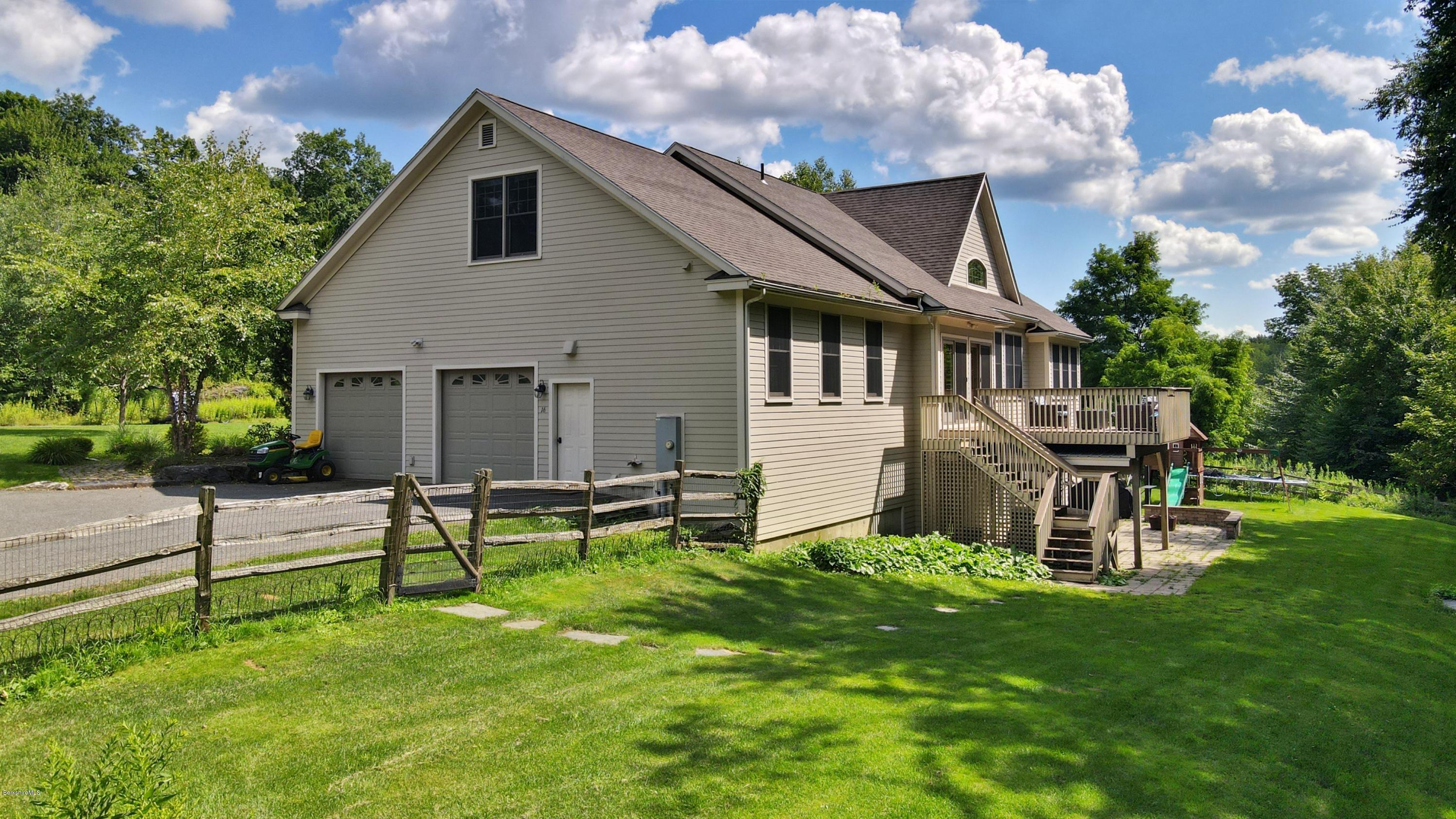 16 Lillybrook Road Pittsfield, MA 01201 - Photo 4 of 38 a view of a house with a yard and sitting area