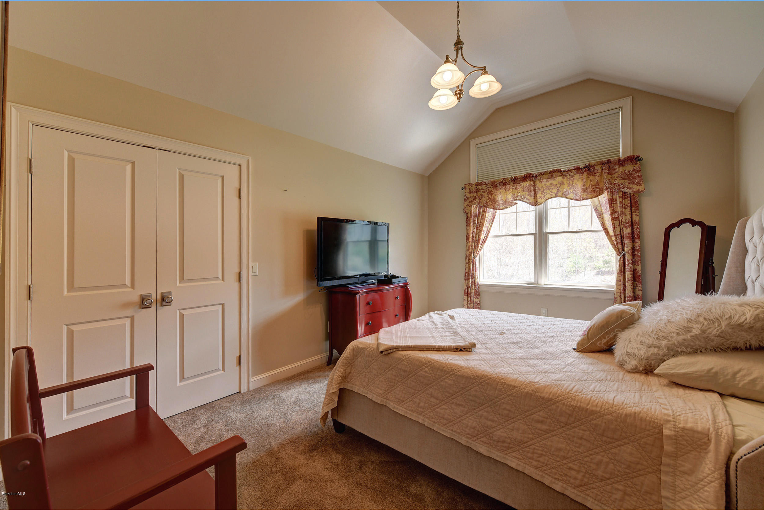 16 Lillybrook Road Pittsfield, MA 01201 - Photo 33 of 38 a bedroom with a bed and a flat screen tv