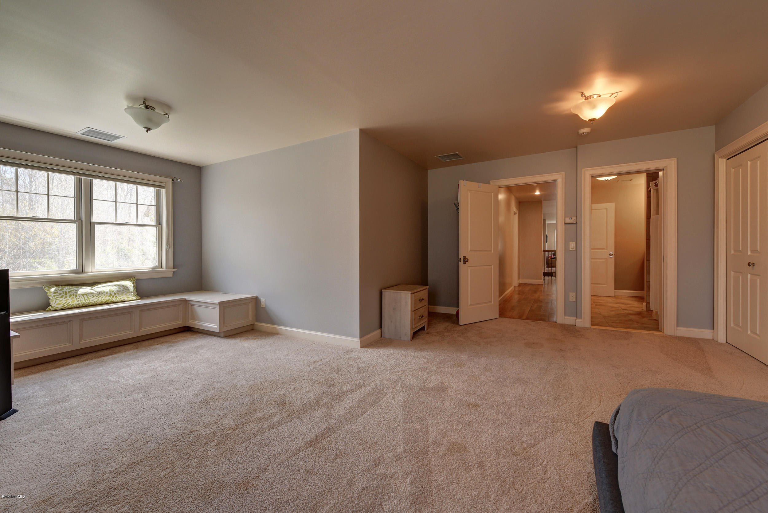 16 Lillybrook Road Pittsfield, MA 01201 - Photo 36 of 38 an empty room with windows and view of kitchen