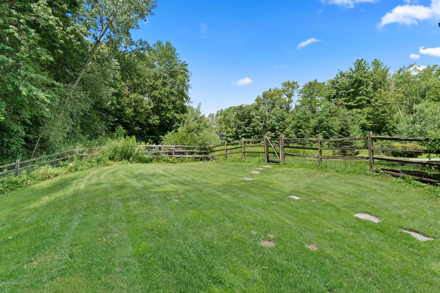 16 Lillybrook Road Pittsfield, MA 01201 - Photo 7 of 38 a big yard with lots of green space and plants
