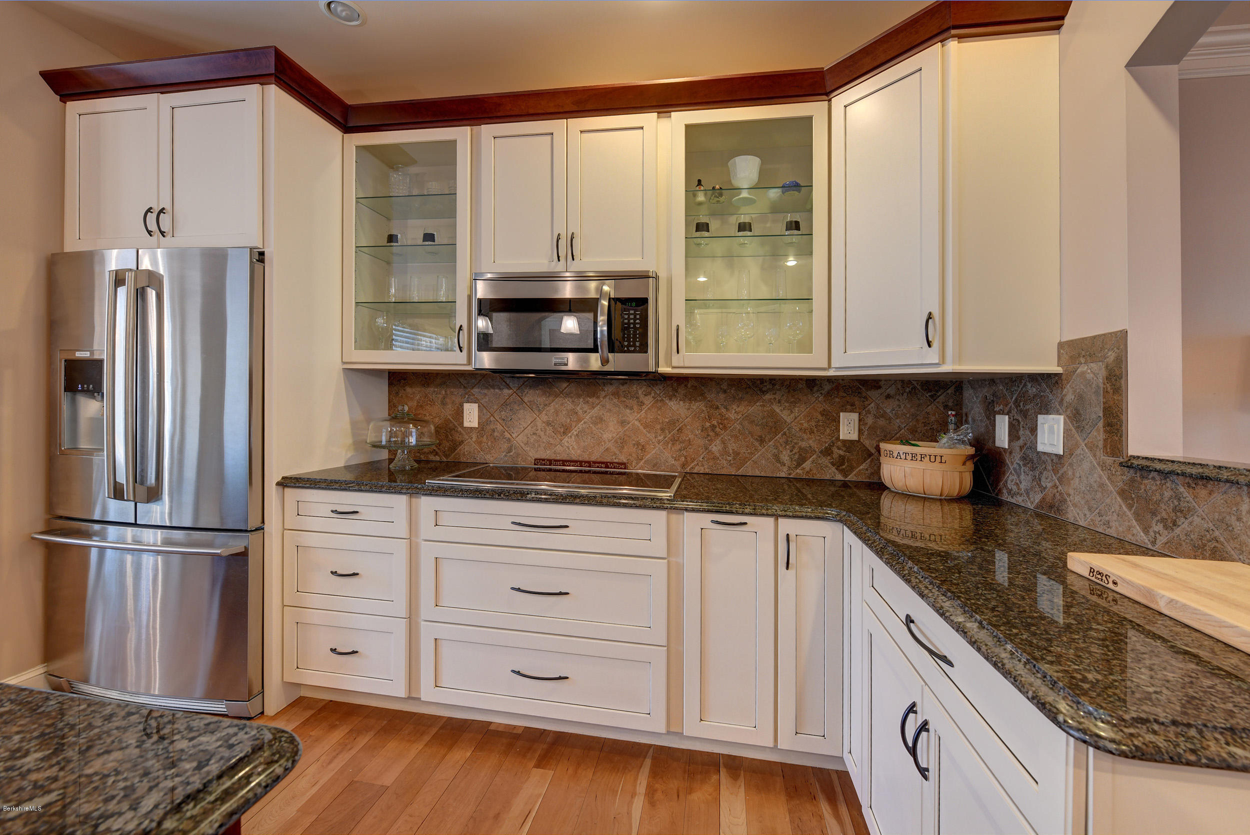 16 Lillybrook Road Pittsfield, MA 01201 - Photo 10 of 38 a kitchen with stainless steel appliances granite countertop a refrigerator sink and cabinets