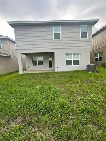 a house view with a garden space