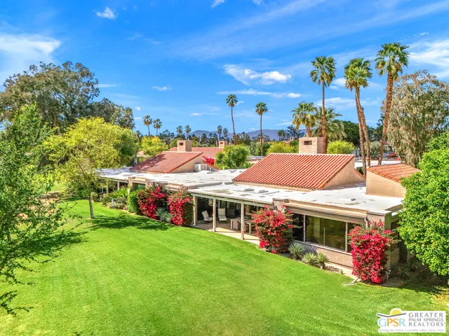 a aerial view of a house with a garden