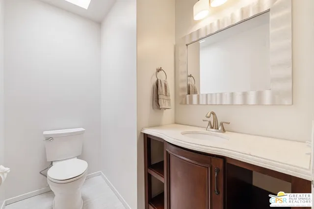 a bathroom with a sink and a toilet