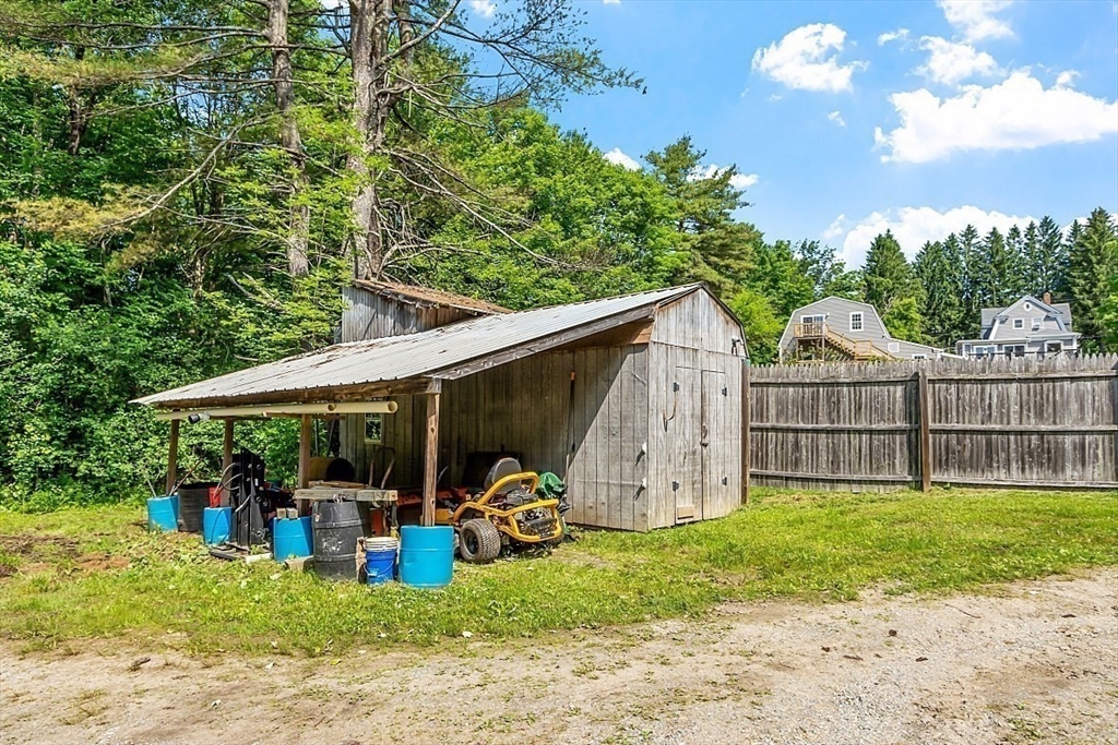 304 Patriots Road Templeton, MA 01468 - Photo 38 of 39 a view of a backyard with small cabin