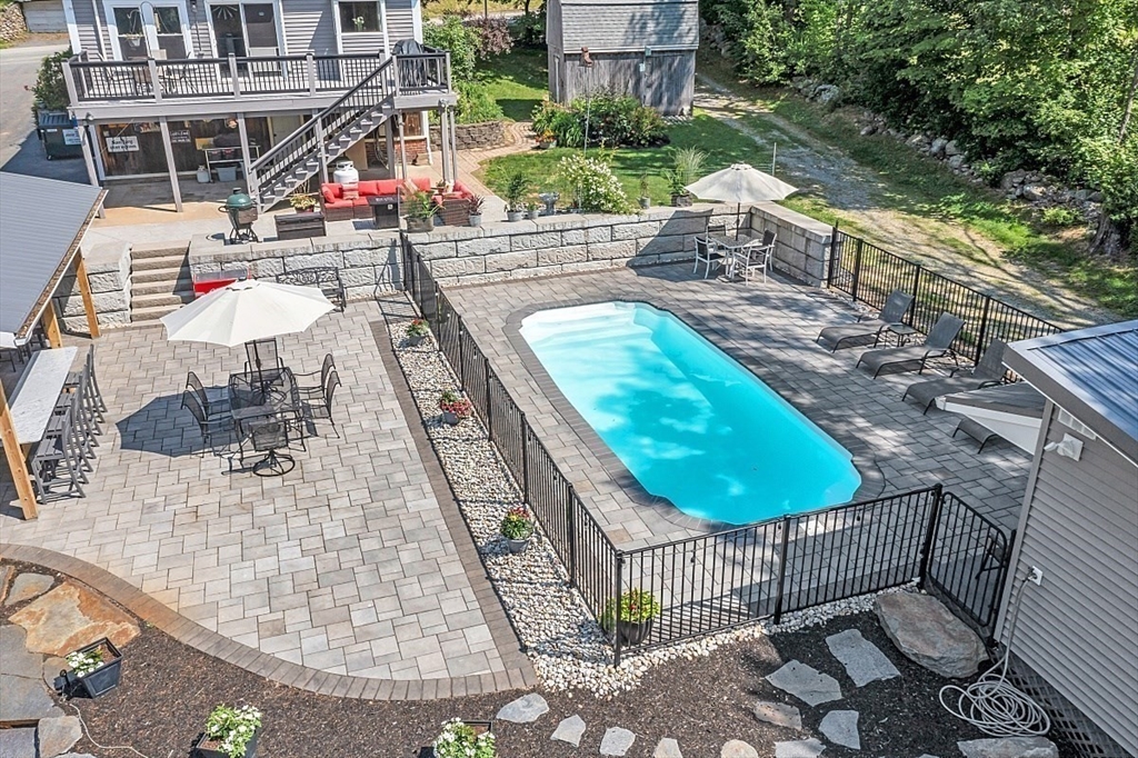304 Patriots Road Templeton, MA 01468 - Photo 5 of 39 a view of a chairs and tables in the patio