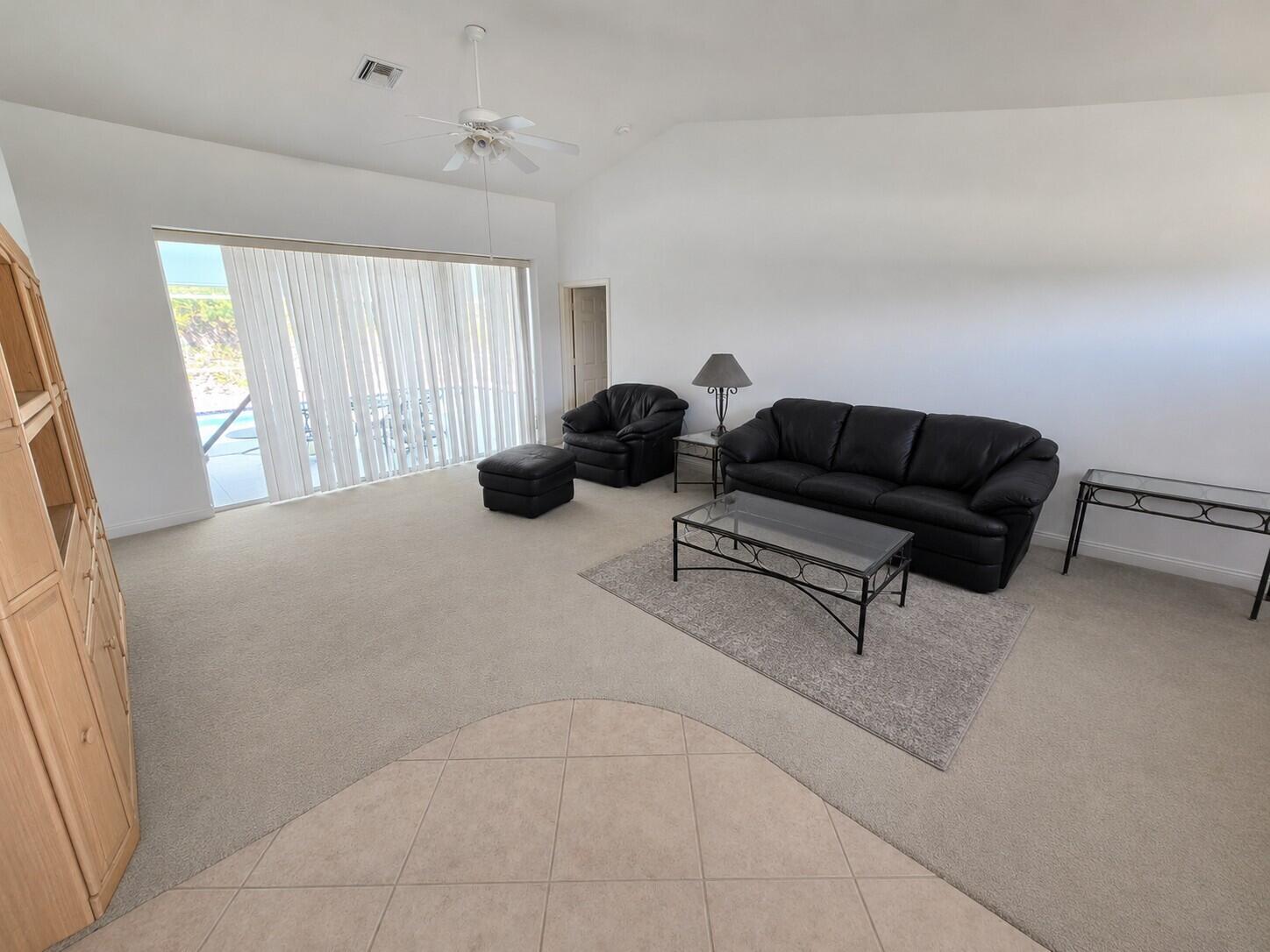 2049 San Marco Road Marco Island, FL 34145 - Photo 41 of 71 Living Room to Pool with AI Editing