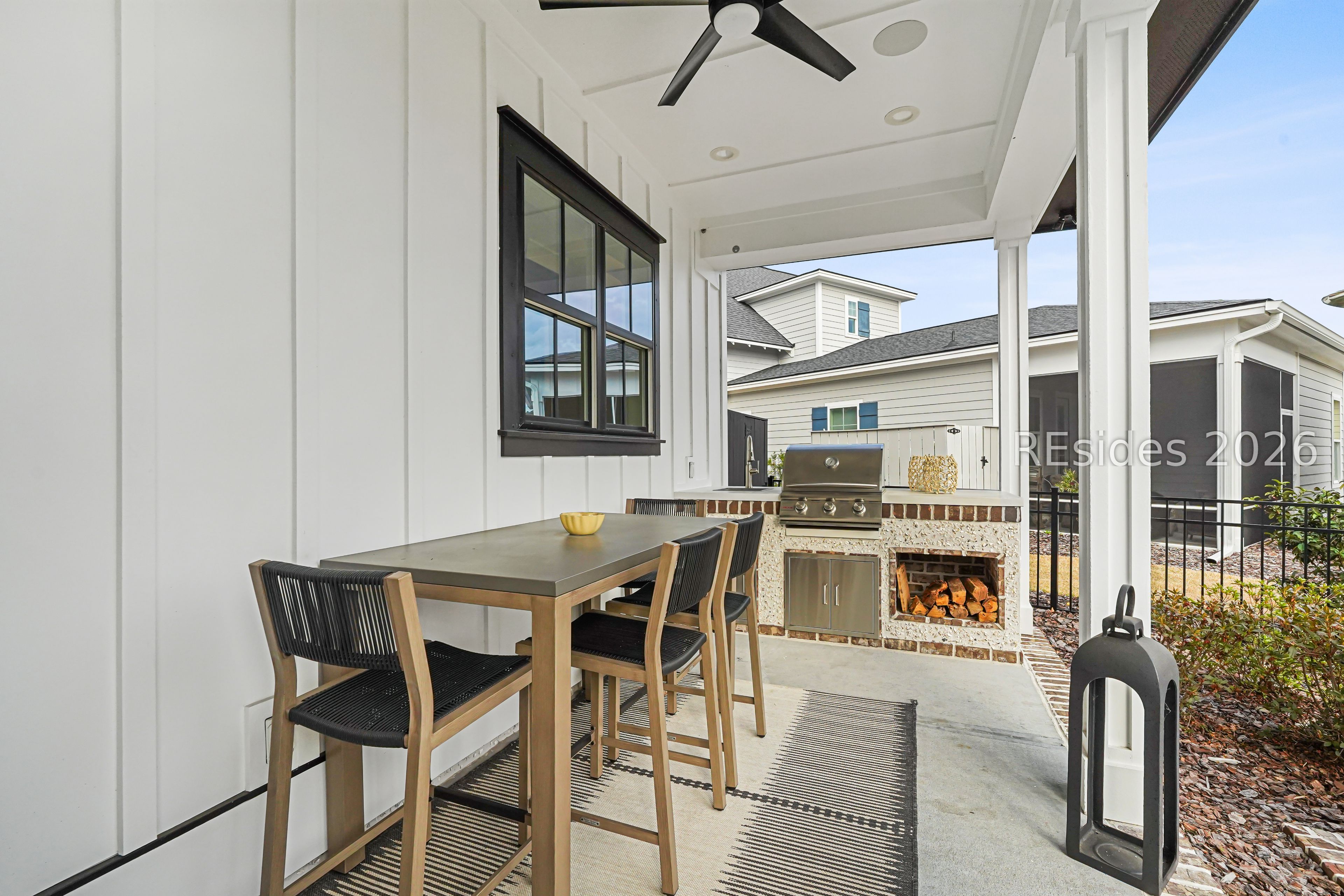93 Anchor Bend Bluffton, SC 29910 - Photo 30 of 54 Backyard covered porch with outdoor kitchen