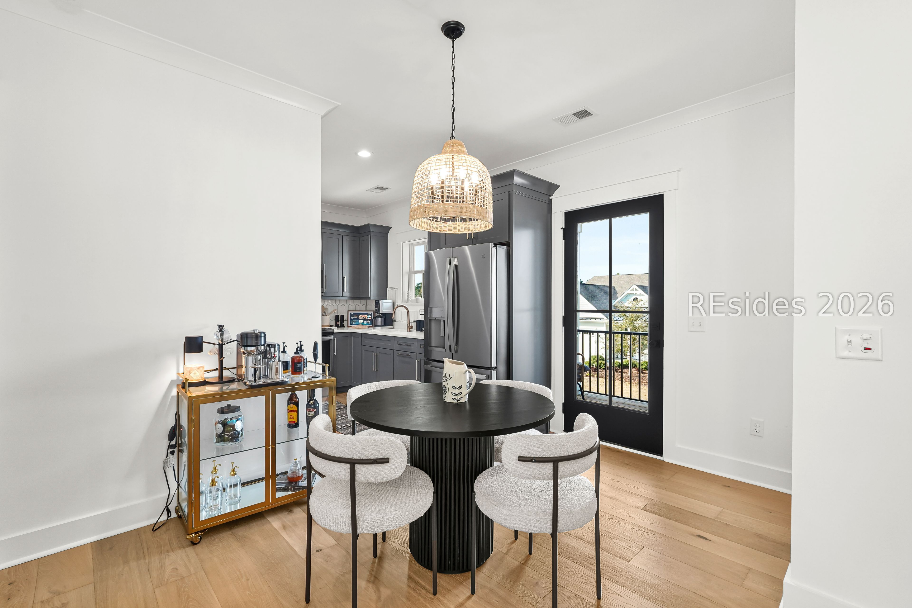 93 Anchor Bend Bluffton, SC 29910 - Photo 39 of 54 Dining area to kitchen, door to private balcony