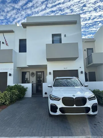 a bedroom with furniture and a fireplace