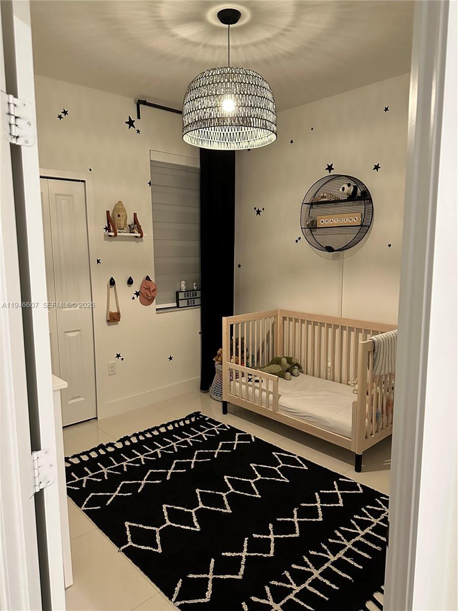 507 Southwest 91st Court, Unit 507 Miami, FL 33174 - Photo 8 of 15 a view of a hallway and wooden floor with entryway