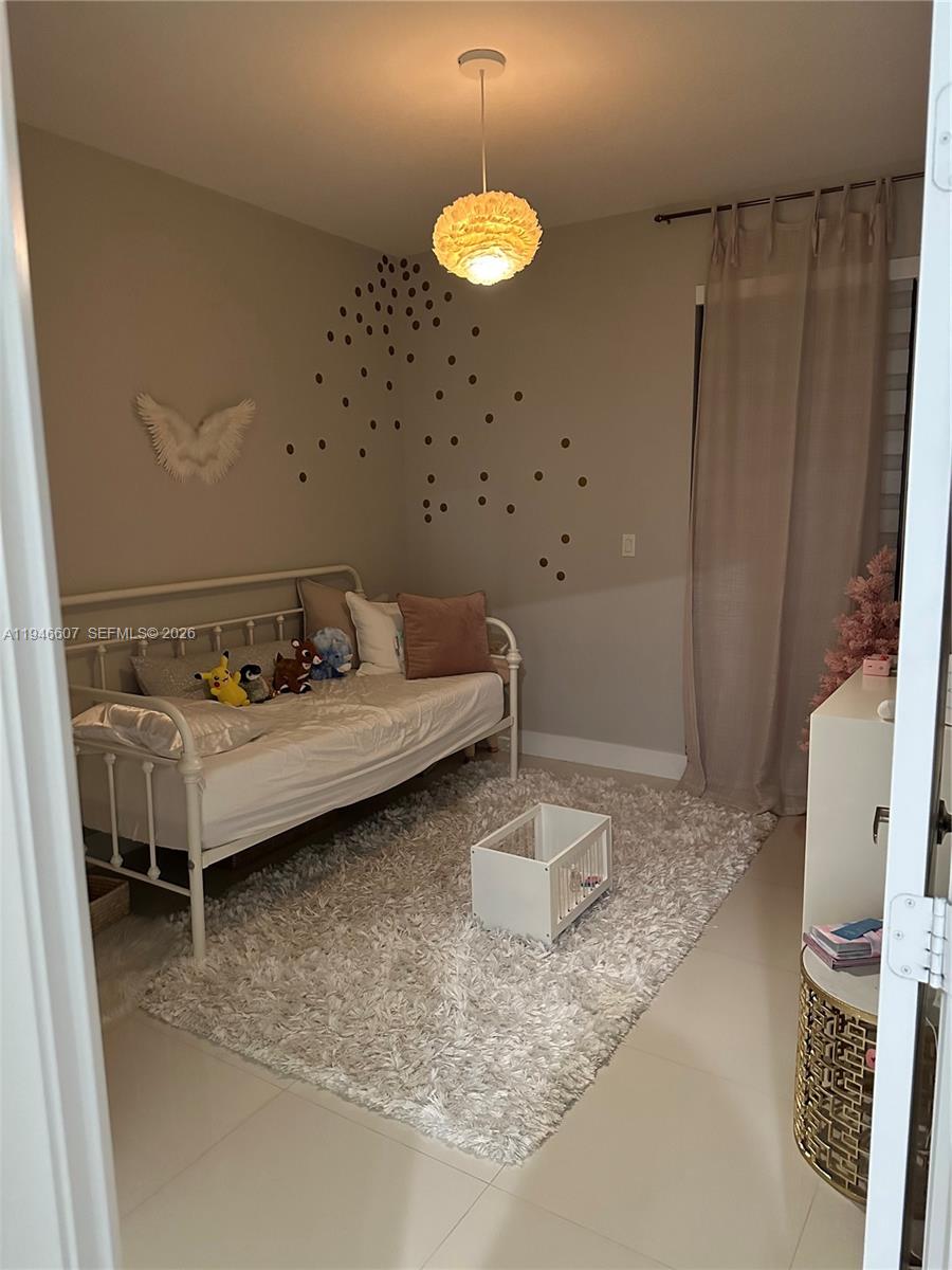 507 Southwest 91st Court, Unit 507 Miami, FL 33174 - Photo 10 of 15 a bathroom with a sink and a mirror