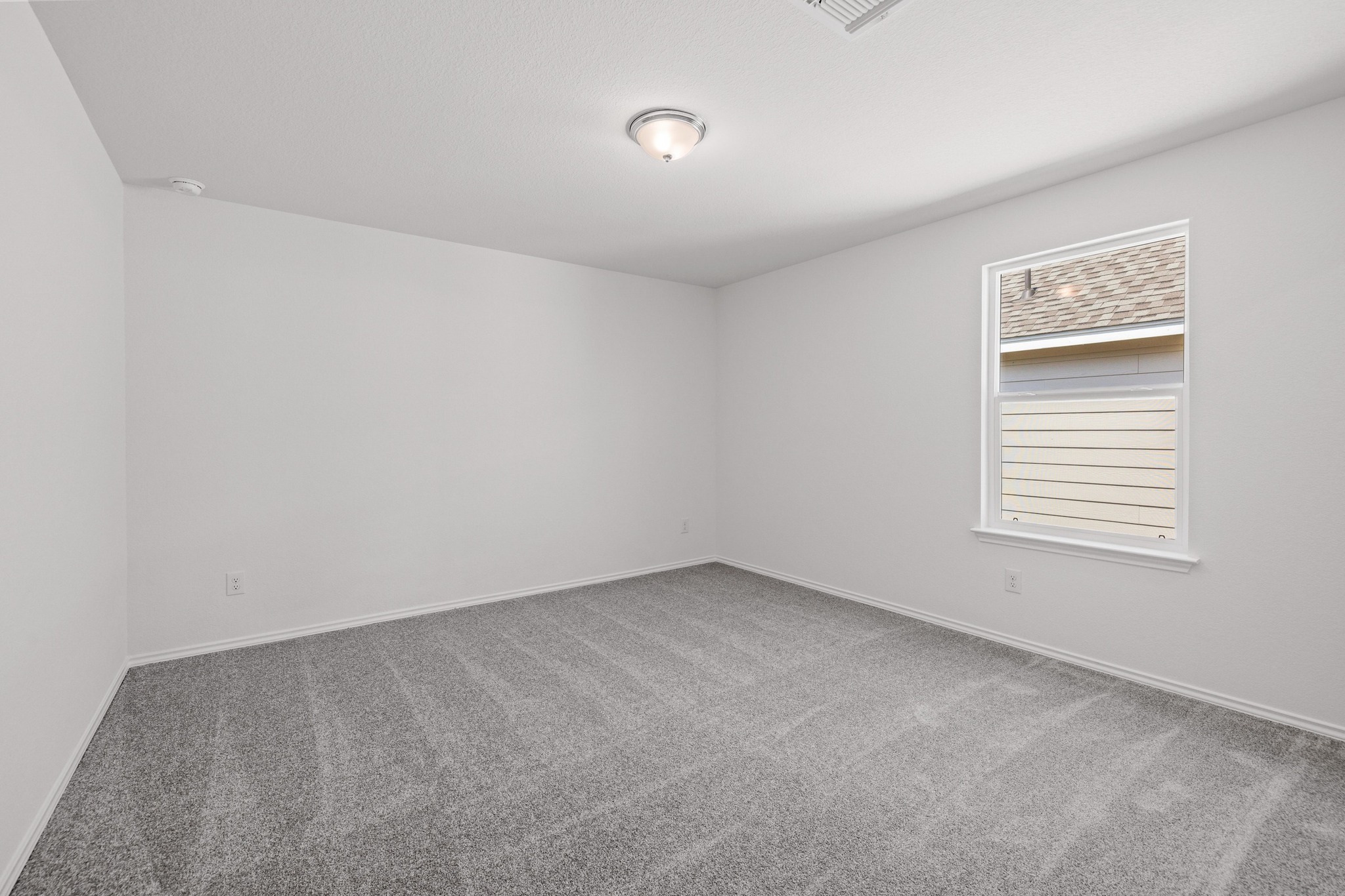 260 Feathers Street Jarrell, TX 76537 - Photo 23 of 34 a view of an empty room with a window