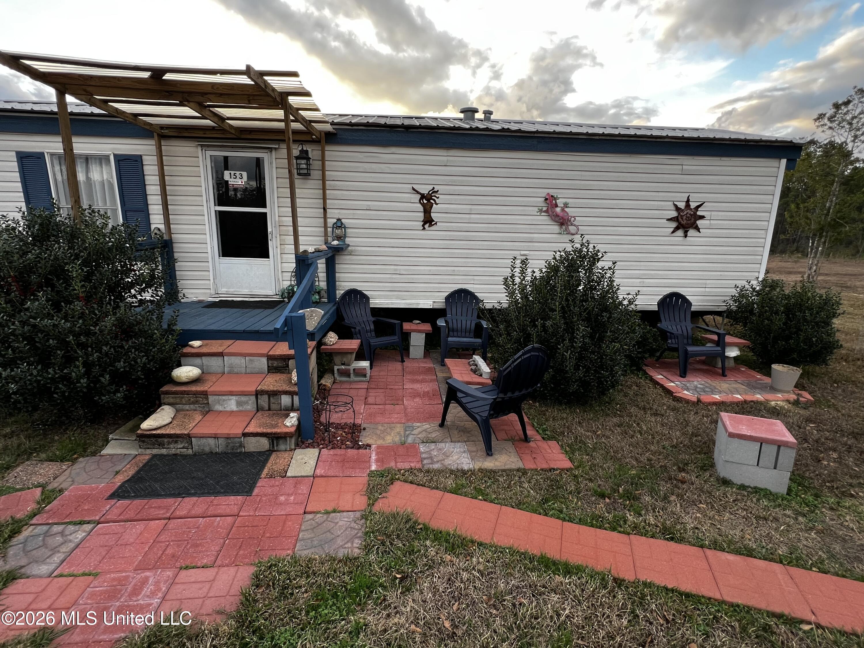 153 C F Eubanks Road Lucedale, MS 39452 - Photo 3 of 19 IMG_7203