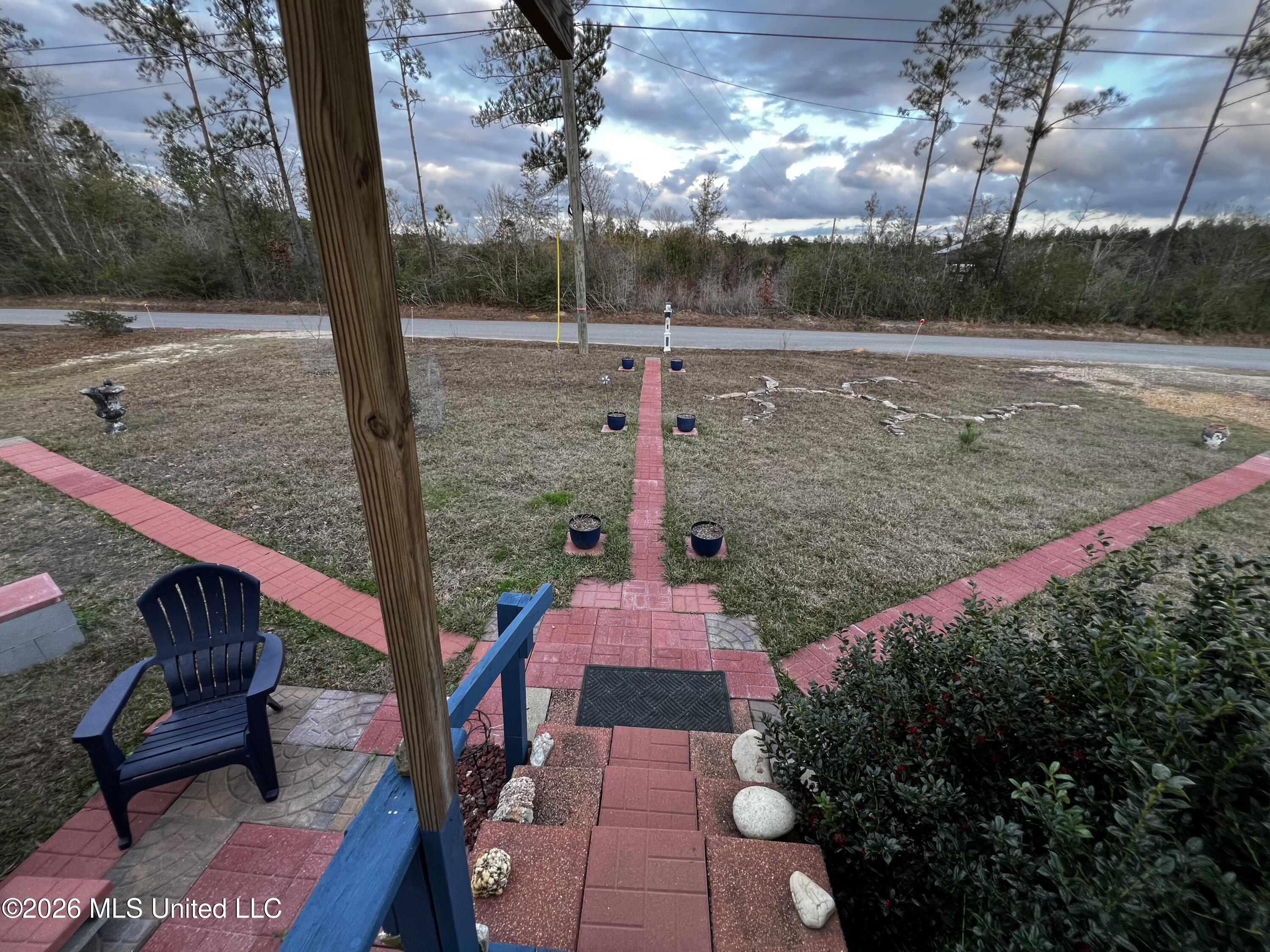 153 C F Eubanks Road Lucedale, MS 39452 - Photo 4 of 19 IMG_7204