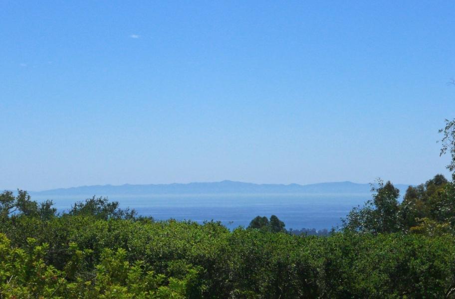 900 Park Montecito Ca Montecito, CA 93108 - Photo 12 of 21 an aerial view of green landscape with trees houses and mountain view