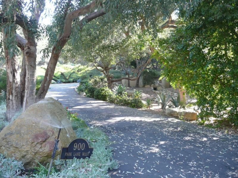900 Park Montecito Ca Montecito, CA 93108 - Photo 14 of 21 a backyard of a house with lots of green space