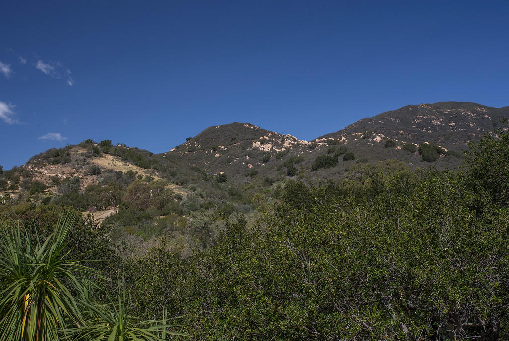 900 Park Montecito Ca Montecito, CA 93108 - Photo 20 of 21 a view of a large building with a mountain in the background