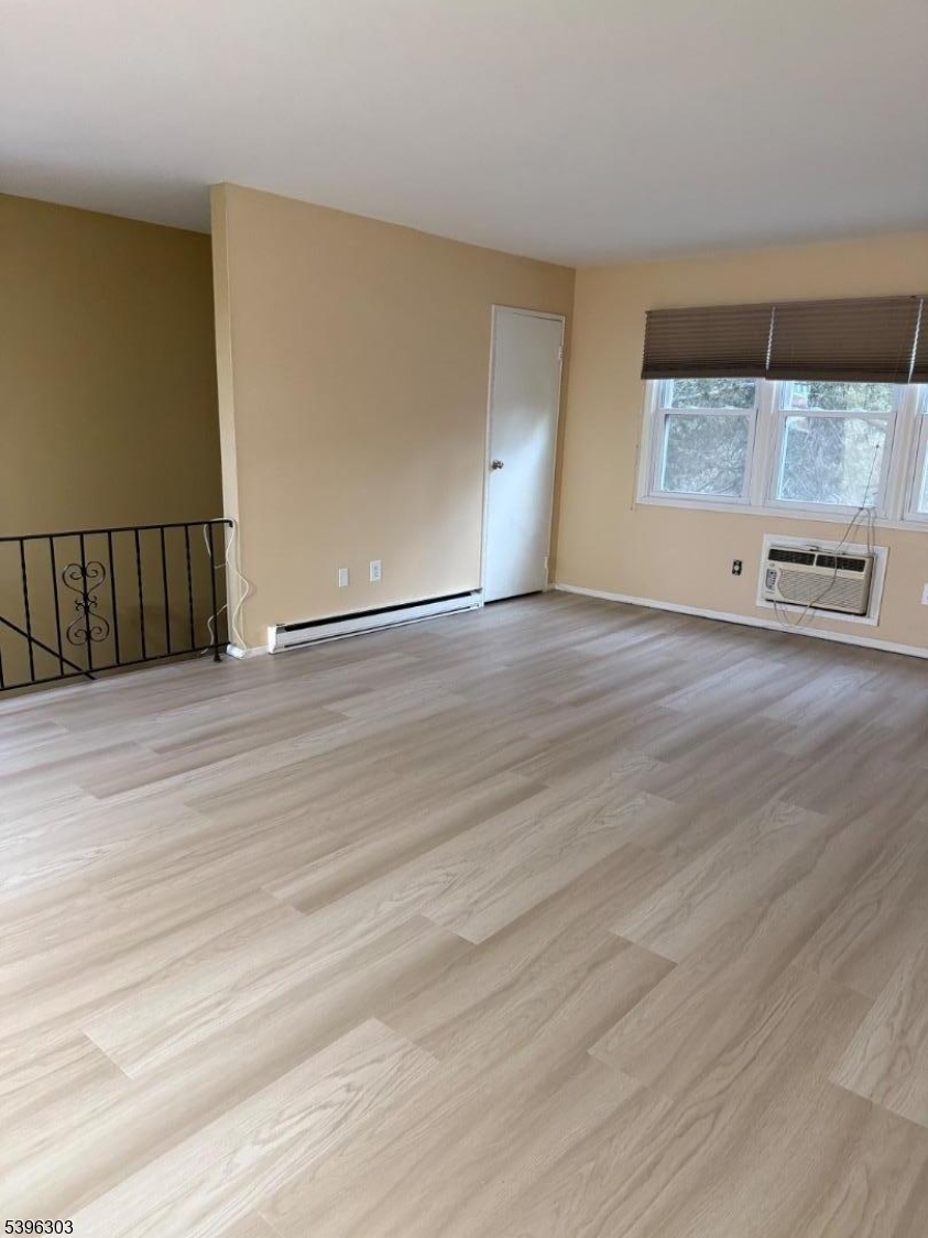 680 Highway 15, Unit 41 Lake Hopatcong, NJ 07849 - Photo 14 of 18 a view of a room with wooden floor and window