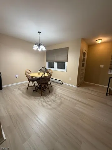 a patio with table and chairs