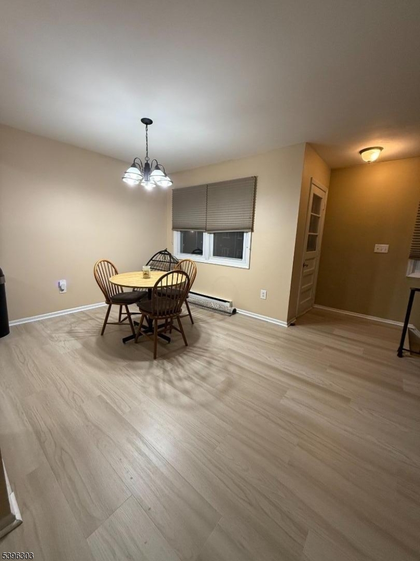 680 Highway 15, Unit 41 Lake Hopatcong, NJ 07849 - Photo 3 of 18 a patio with table and chairs