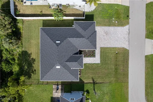 an aerial view of a house having yard