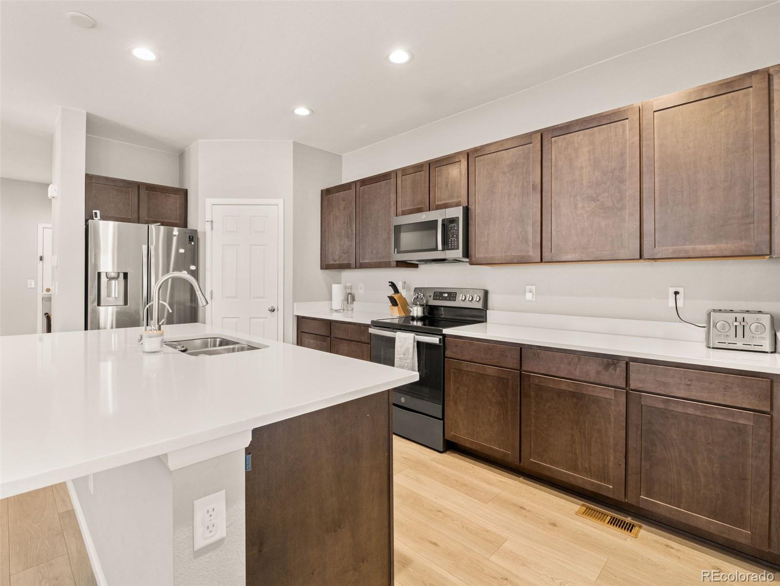 6513 North Ceylon Street Denver, CO 80249 - Photo 11 of 33