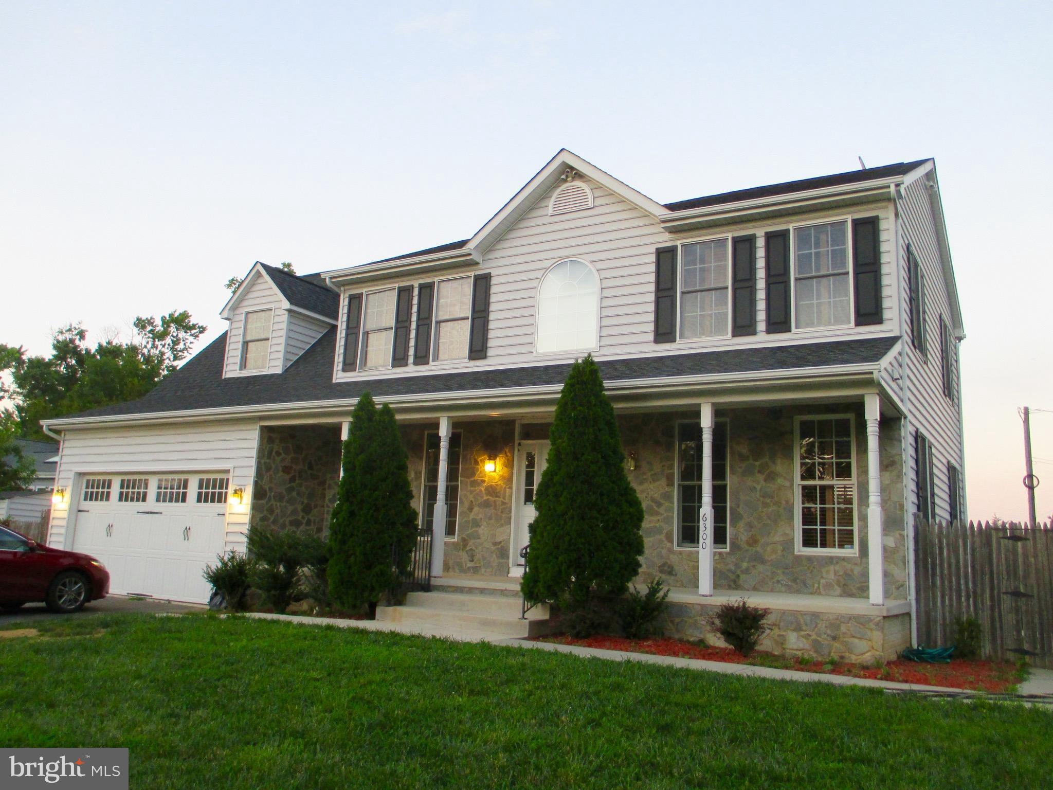 6300 Lincolnia Road Alexandria, VA 22312 - Photo 1 of 30 a front view of a house with a garden and plants
