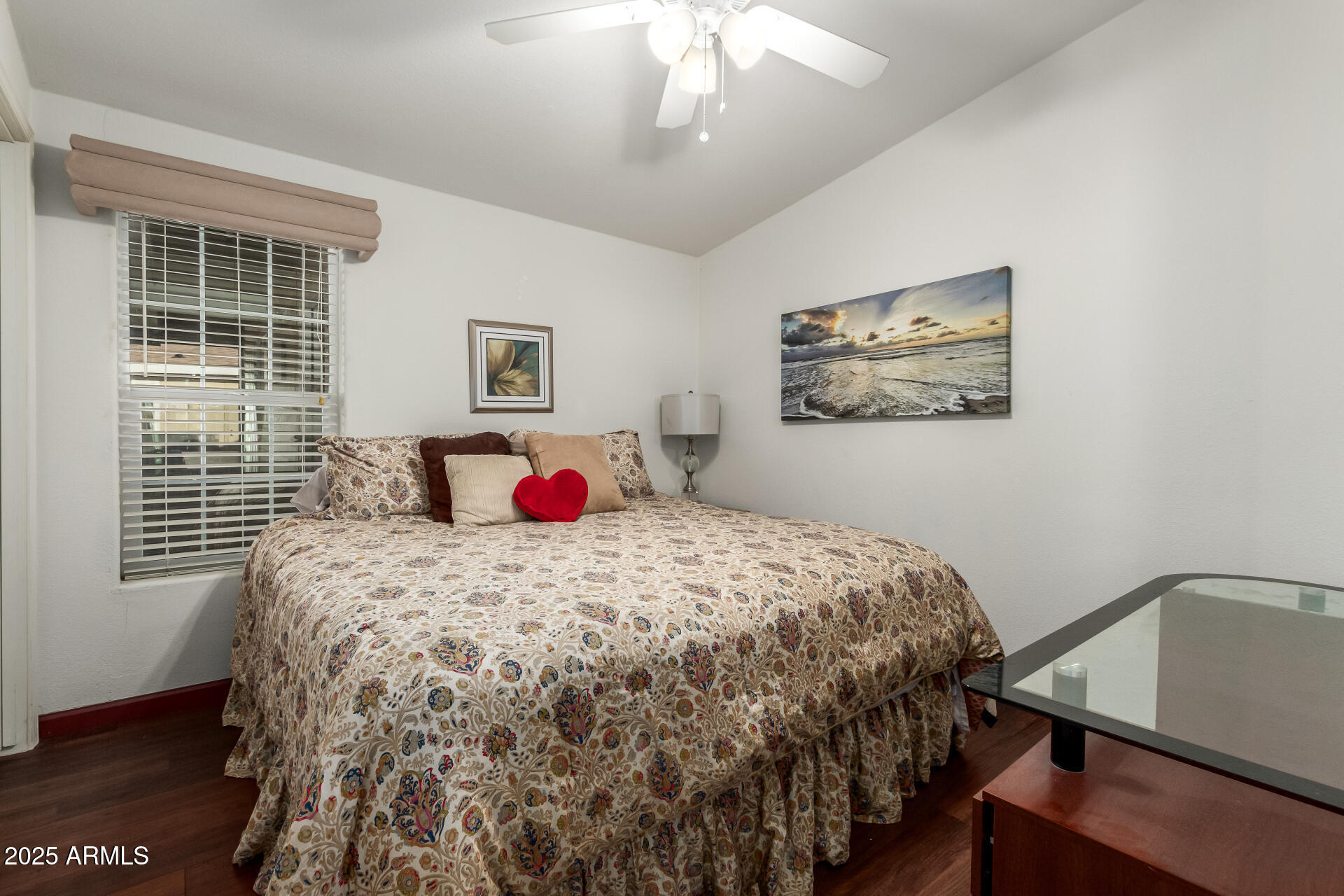 11201 North El Mirage Road, Unit F16 El Mirage, AZ 85335 - Photo 18 of 29 a bedroom with a bed and a window