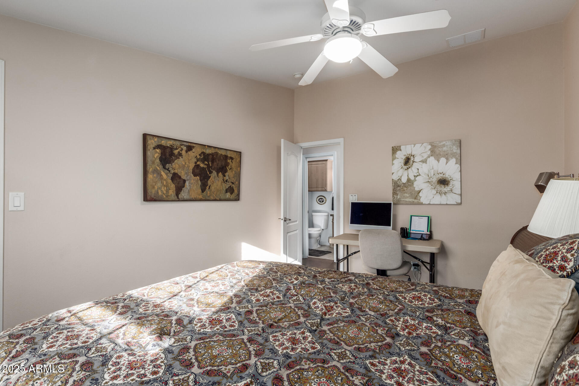 11201 North El Mirage Road, Unit F16 El Mirage, AZ 85335 - Photo 21 of 29 a bedroom with bed and furniture