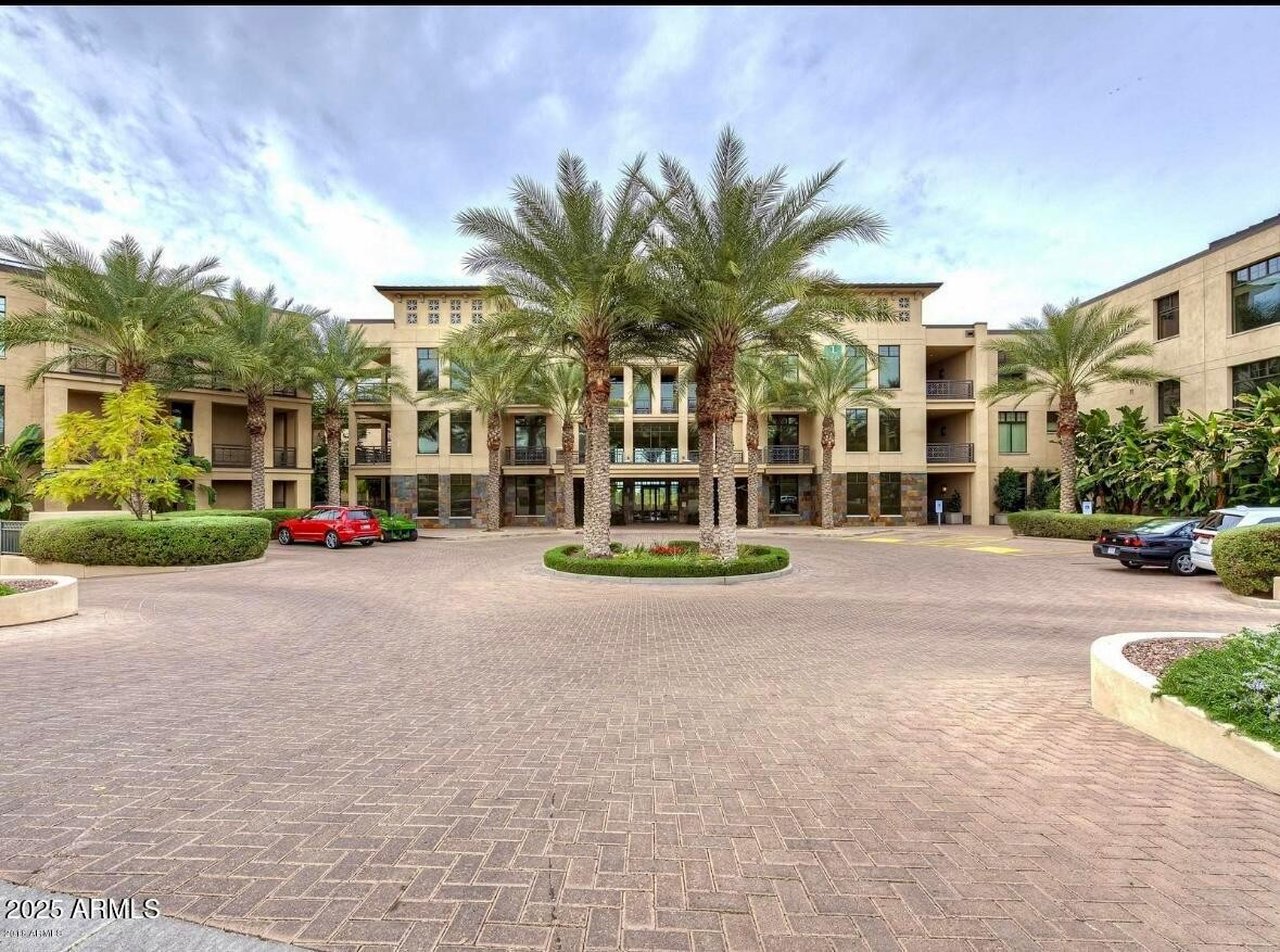 8 Biltmore Estate, Unit 112 Phoenix, AZ 85016 - Photo 1 of 14 a view of a building with a yard
