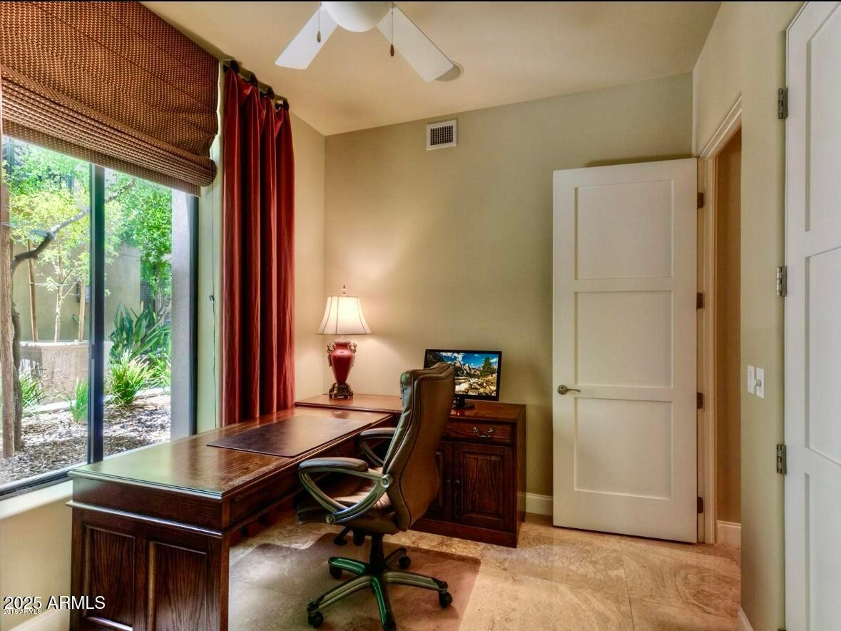 8 Biltmore Estate, Unit 112 Phoenix, AZ 85016 - Photo 13 of 14 a view of a workspace with furniture and a window