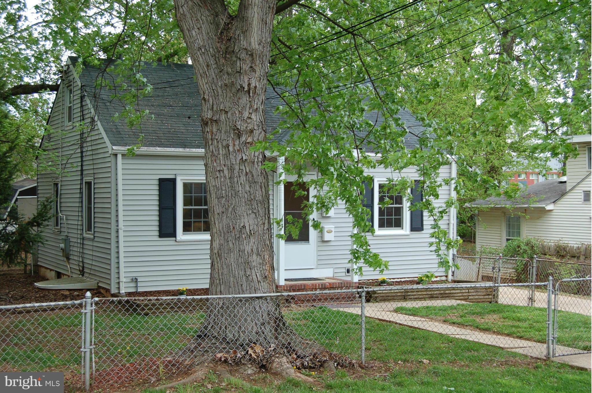 4307 Fernhill Road Silver Spring, MD 20906 - Photo 2 of 8 a view of a house with a yard
