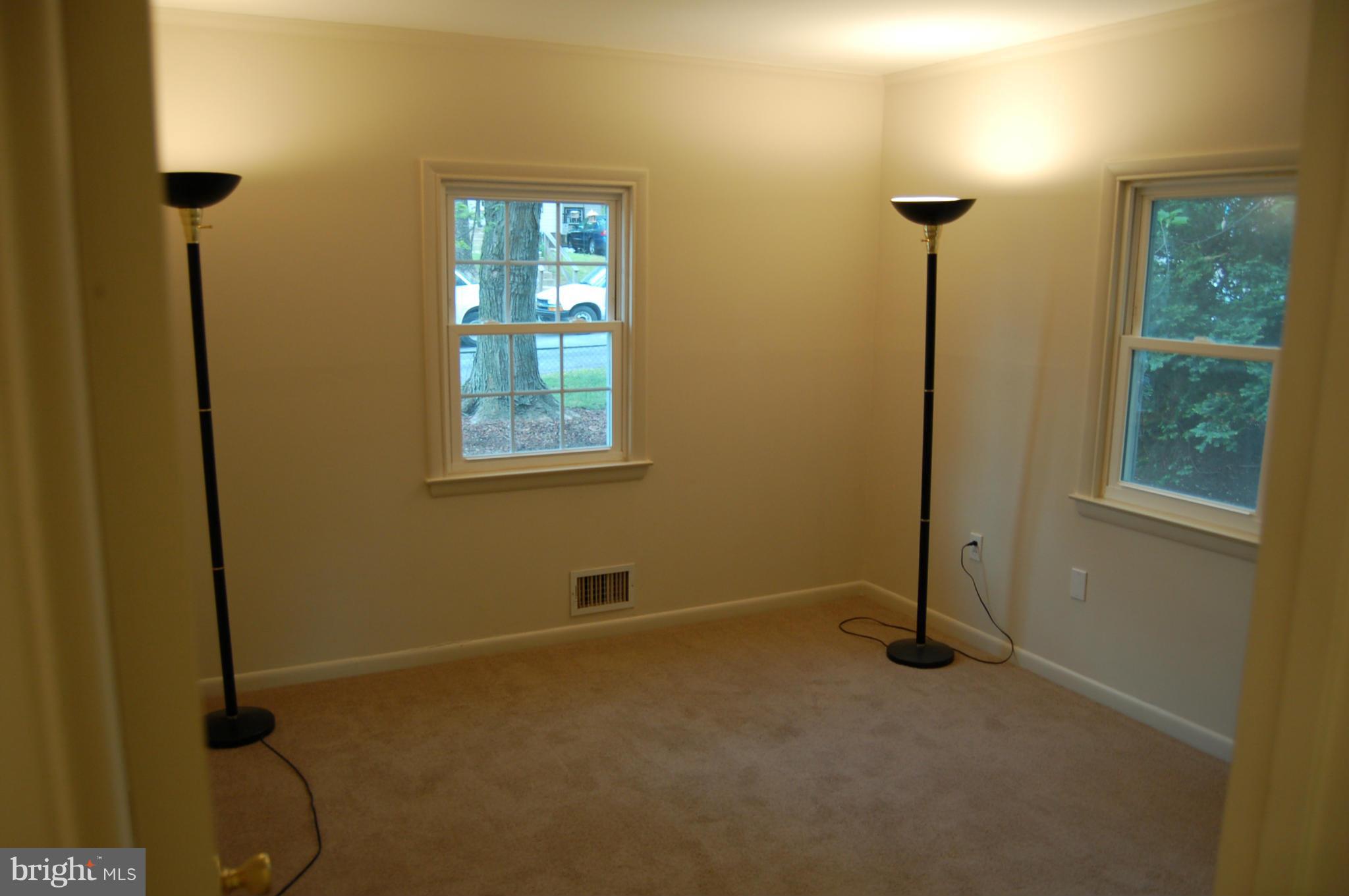 4307 Fernhill Road Silver Spring, MD 20906 - Photo 4 of 8 a view of an empty room with windows