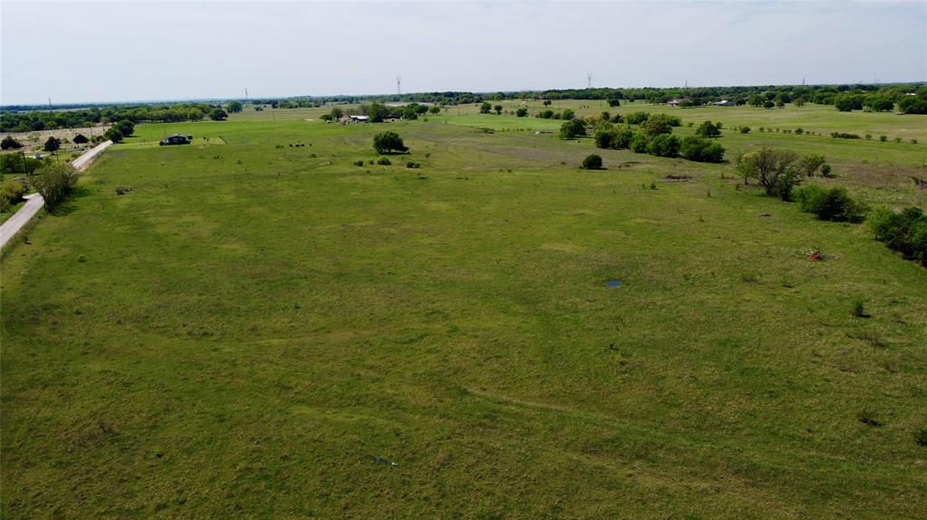 3 County Road 1475 Chico, TX 76431 - Photo 2 of 8 a view of a field with an ocean