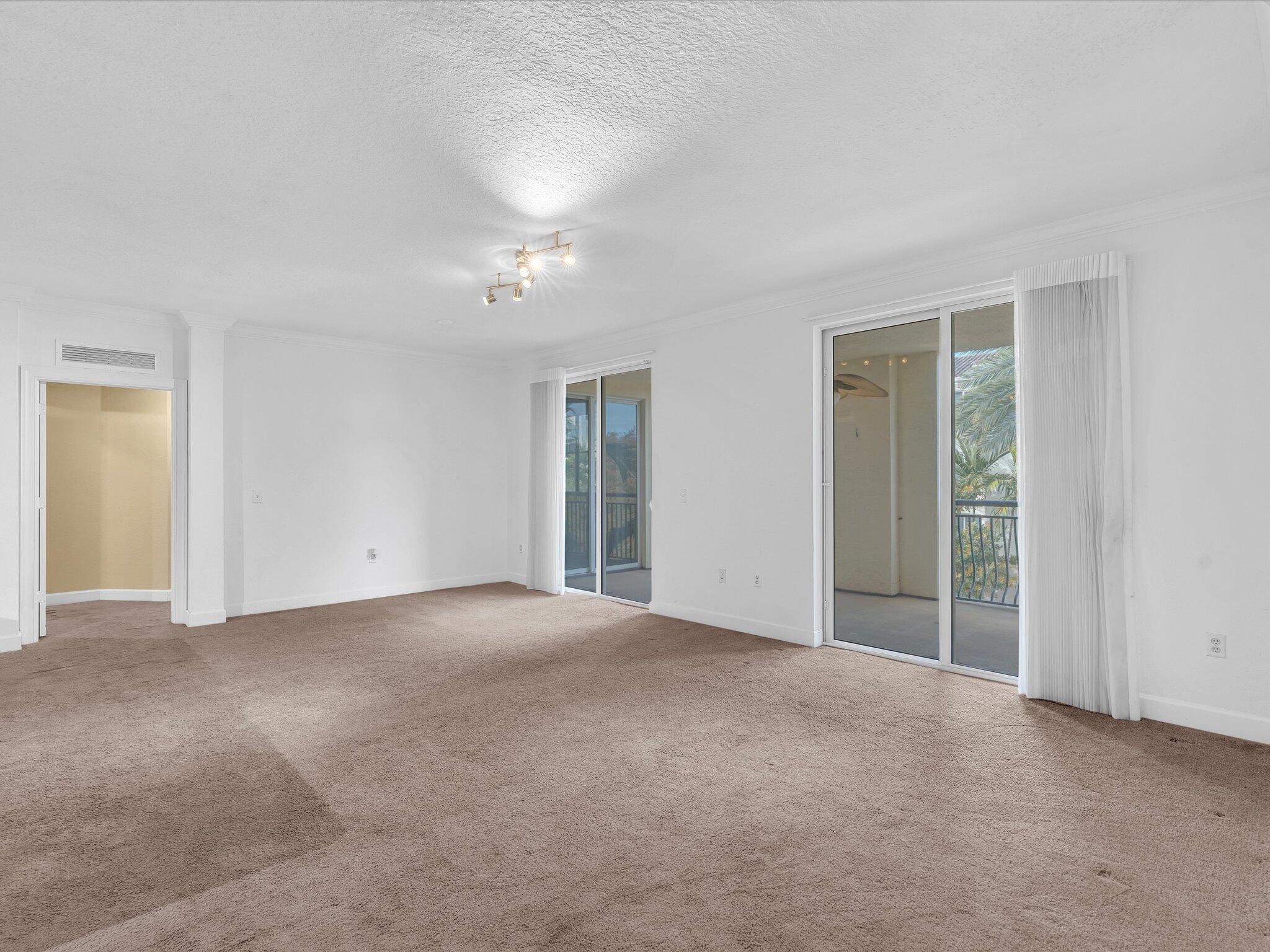 4303 Renaissance Way, Unit 303 Boynton Beach, FL 33426 - Photo 17 of 74 a view of empty room with windows
