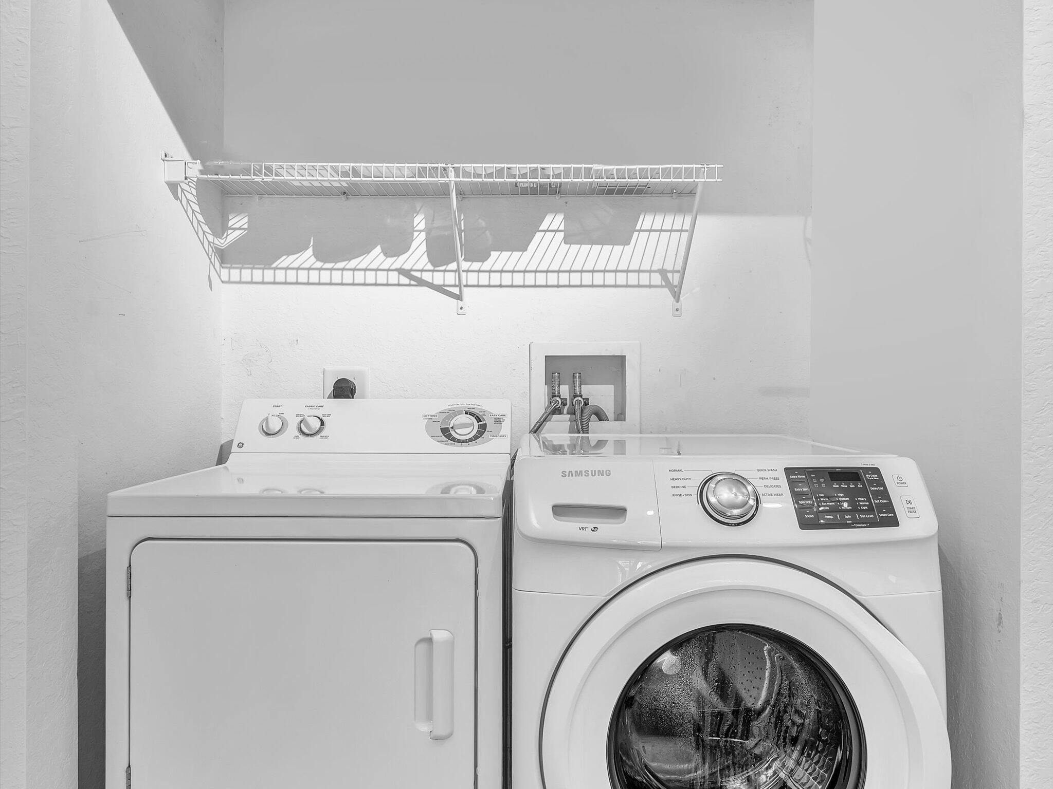 4303 Renaissance Way, Unit 303 Boynton Beach, FL 33426 - Photo 21 of 74 a utility room with dryer and washer