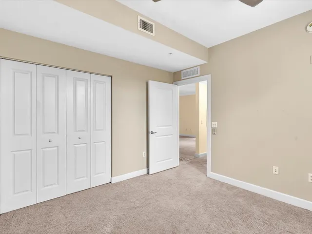 an empty room with a bathroom