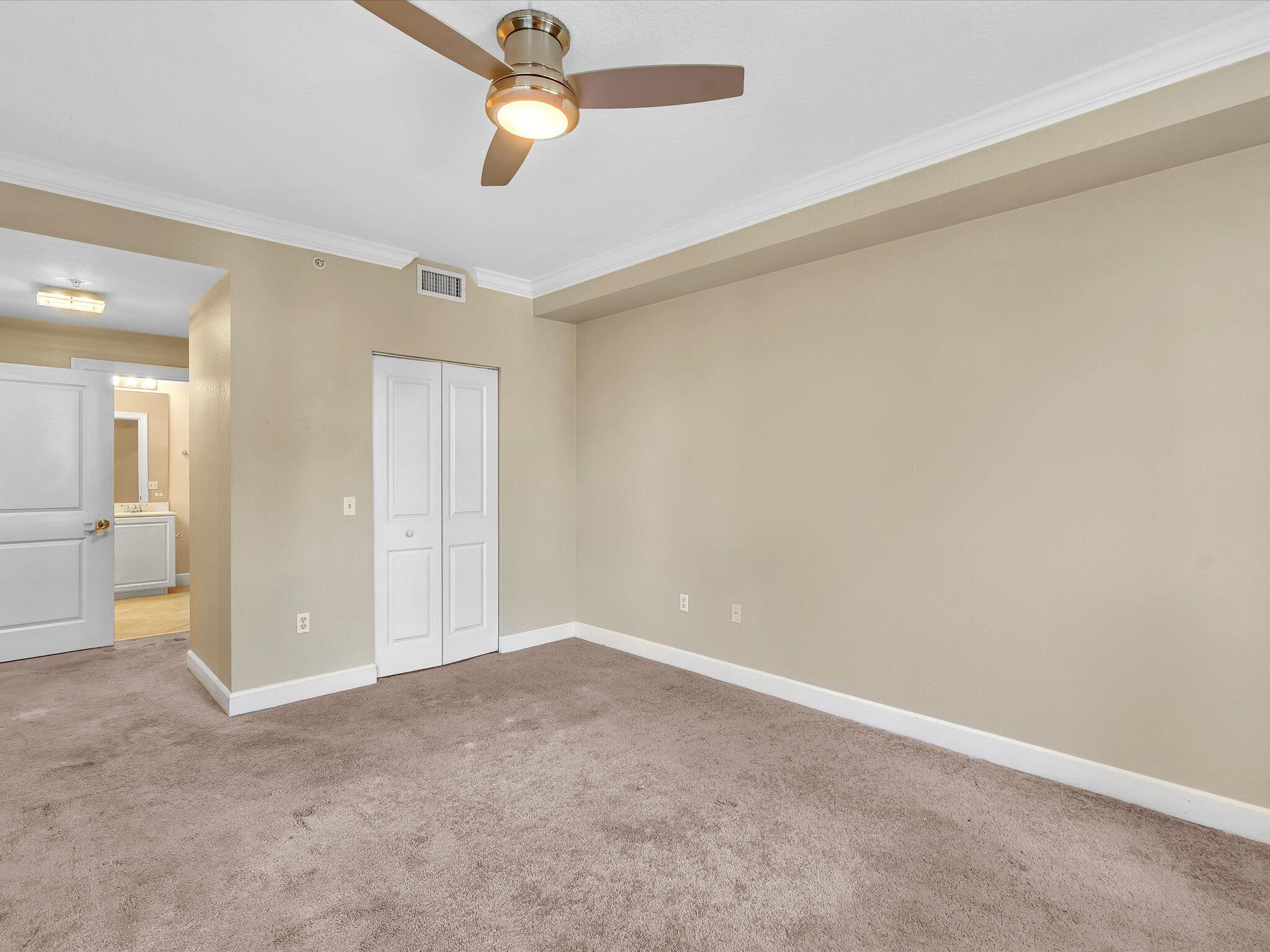 4303 Renaissance Way, Unit 303 Boynton Beach, FL 33426 - Photo 46 of 74 an empty room with a bathroom
