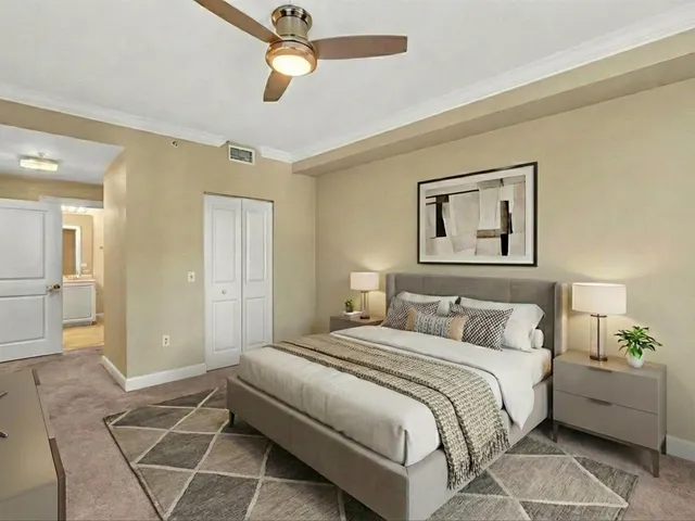 an aerial view of residential building with green space