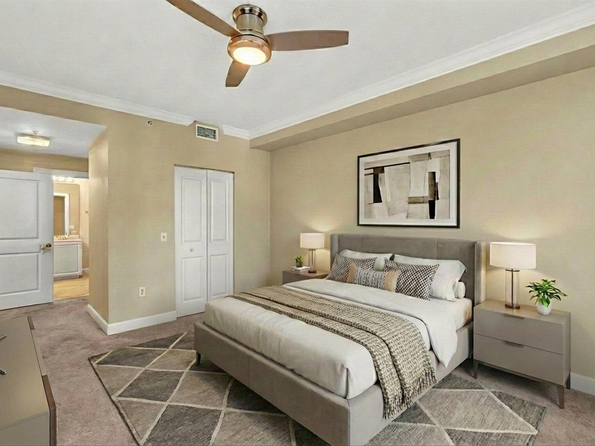 4303 Renaissance Way, Unit 303 Boynton Beach, FL 33426 - Photo 47 of 74 a bedroom with a bed and a chandelier