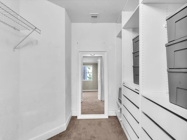 an aerial view of residential building with parking space