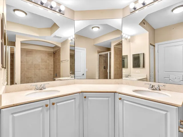 an aerial view of residential building and ocean