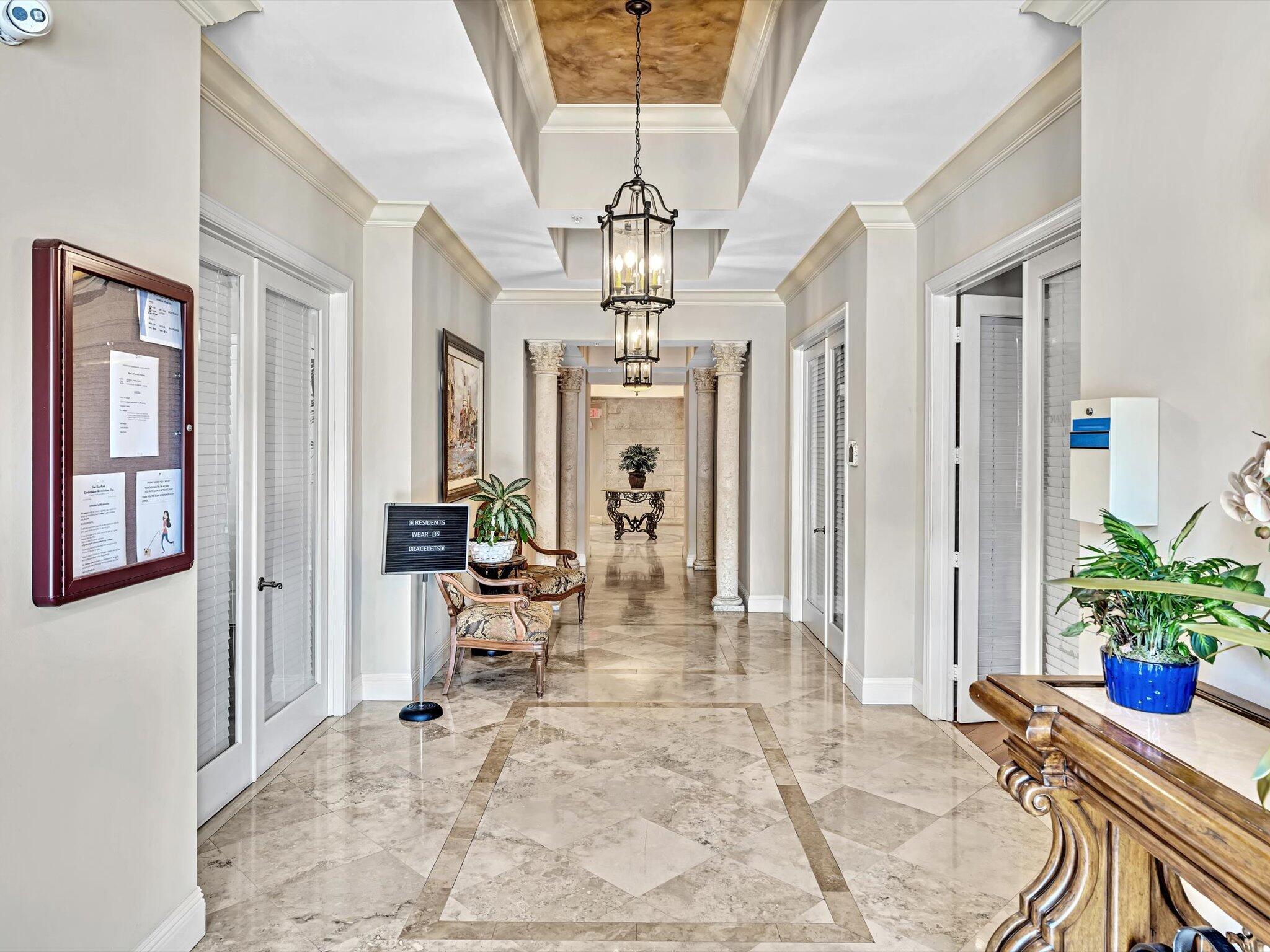 4303 Renaissance Way, Unit 303 Boynton Beach, FL 33426 - Photo 62 of 74 a view of a livingroom and dining room